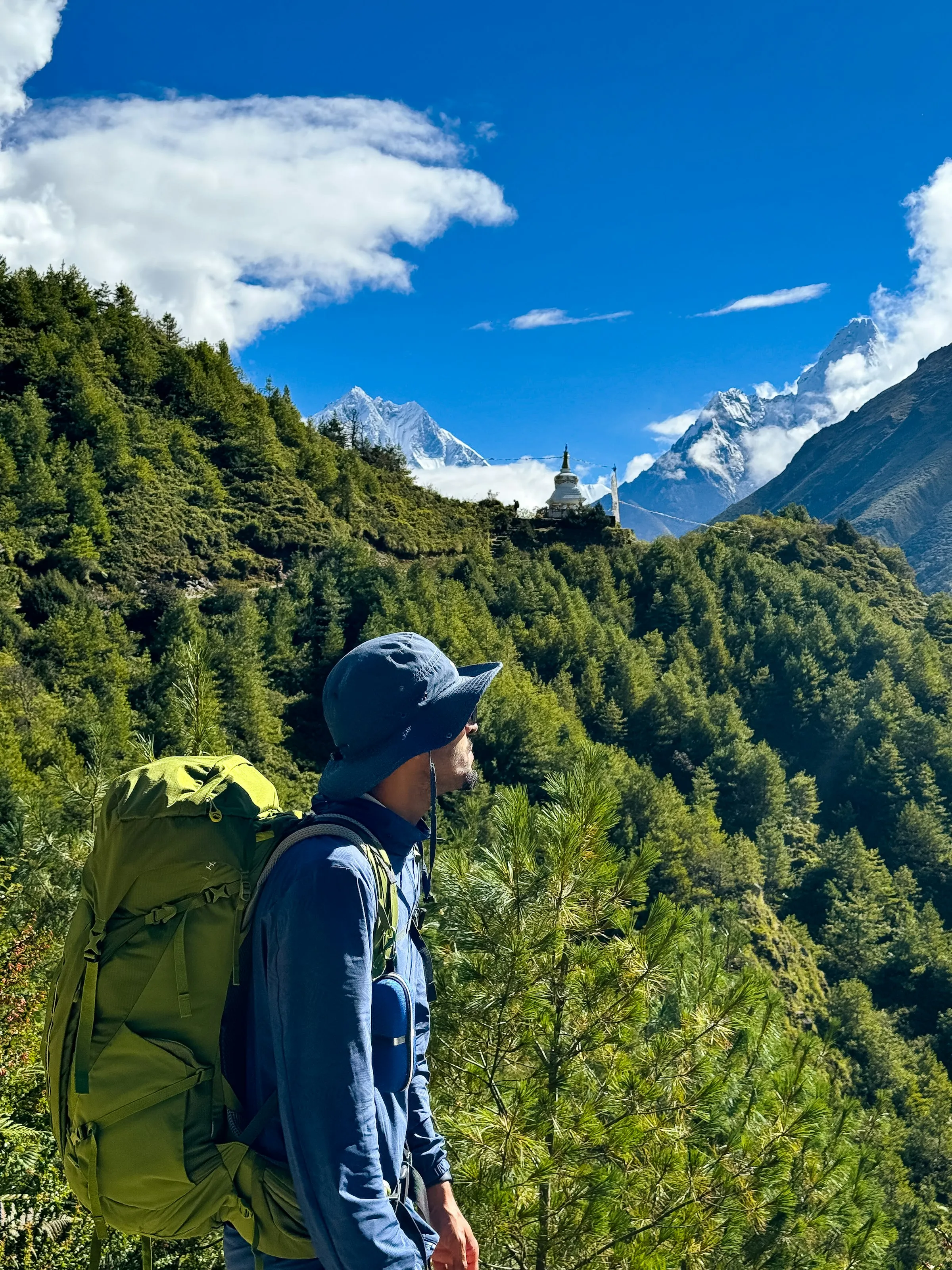 Hiker looking out at snow peaks on the Everest Base Camp trek